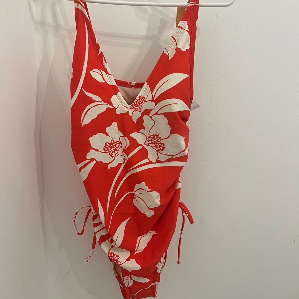 Size L, one-piece Target bathing suit with side rouching and tie.